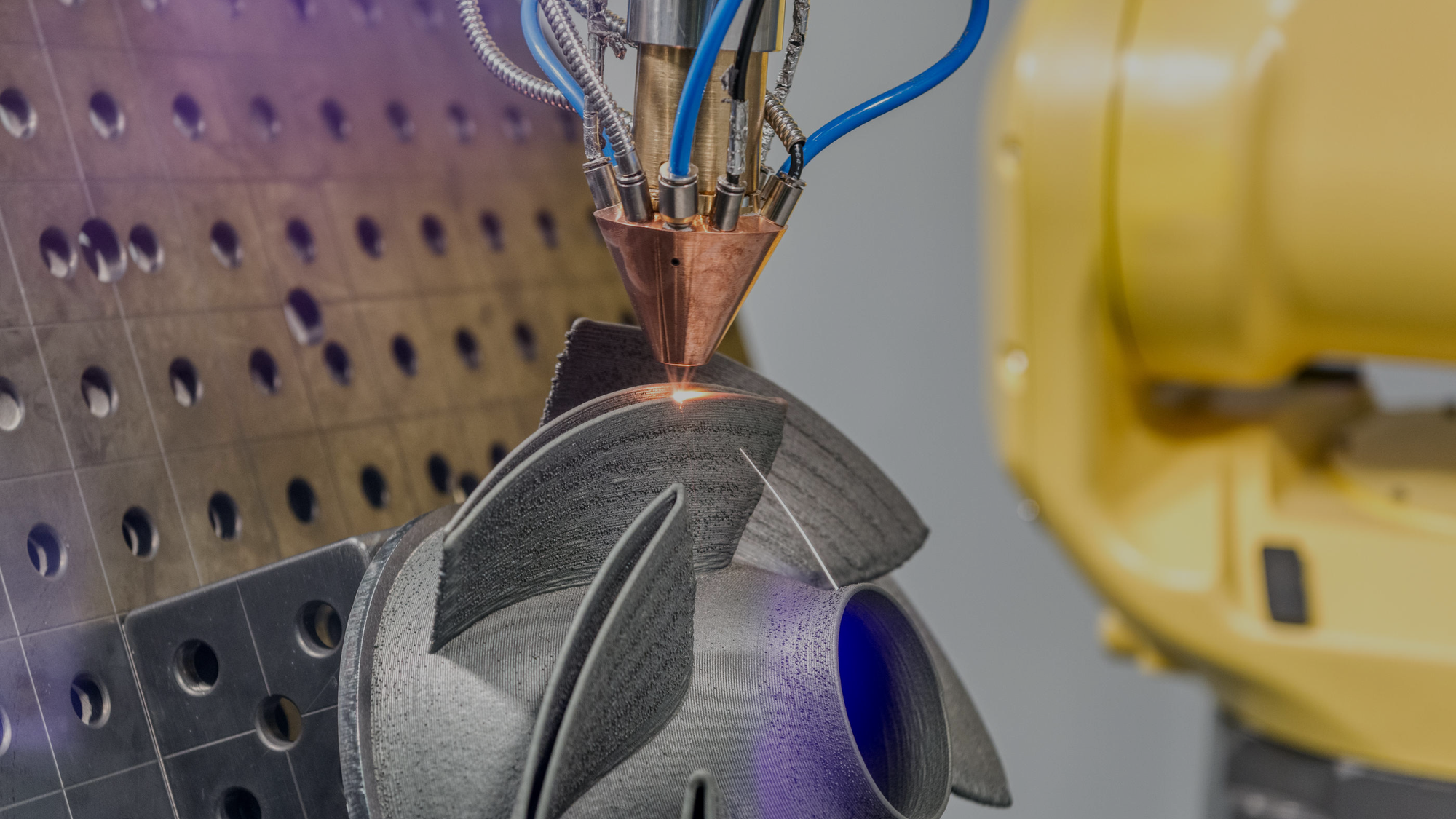 Directed energy deposition additive manufacturing of a metal impeller